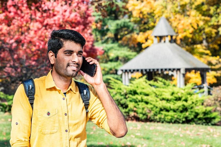 Student makes a phone call to the Center for Healthy Living.